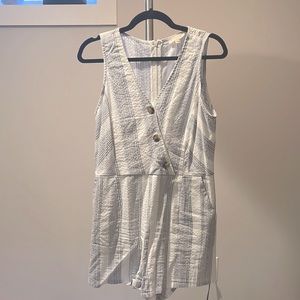 Never been worn! Button up romper